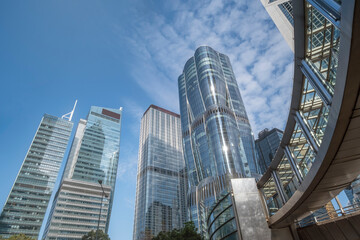 Skyline view of modern skyscrapers under a clear blue sky