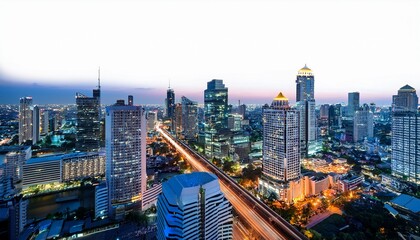 Obraz premium modern bangkok city skyline at night with illuminated buildings isolated on a white background capturing the vibrant urban architecture of thailand