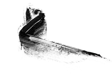 Black mascara brush strokes isolated on white.