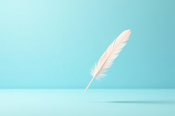 Obraz premium A single, off-white feather floats gently against a light blue backdrop, conveying a sense of serenity and lightness