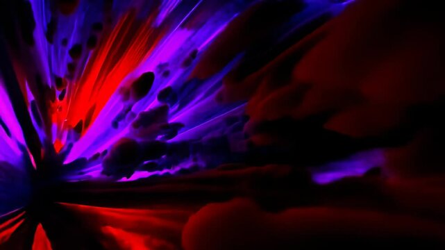 Dynamic abstract scene of high-speed motion through a tunnel of red and purple light streaks radiating from a central point, creating a sense of velocity and warp travel 