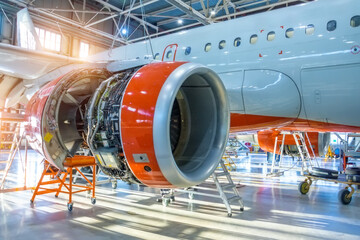 Repair, jet passenger aircraft engine with the hood open blades. Maintenance of parts in aircraft...