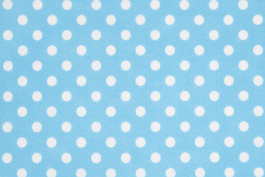 Bright blue polka dot texture background - Powered by Adobe