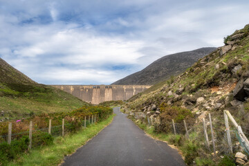 Take delight in serene walk along meandering path that leads to breathtaking dam in Silent Valley...