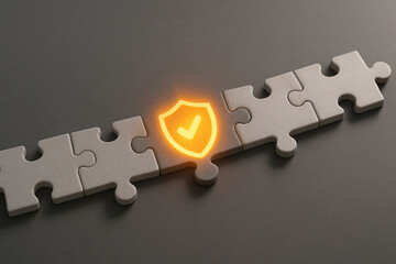 :conceptual puzzle piece with glowing shield symbol represents business security