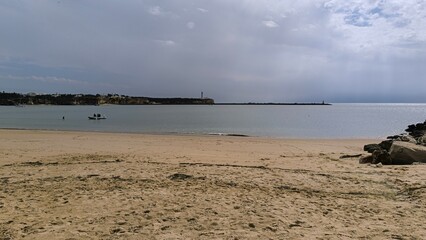 Beach, sand and clouds in the morning. 
