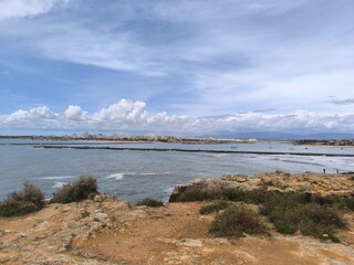 Water carves and dances over the stone-strewn shore. 