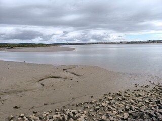 The constant force of the sea reshaping the coastal edge. 