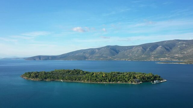 The island opposite the village of Kilada in Europe, Greece, Peloponnese, Argolis, in summer, on a sunny day.&nbsp;
