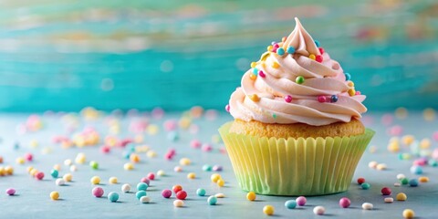 Pastel-colored cupcake with a generous dollop of fluffy buttercream on top, surrounded by sprinkles and edible decorations