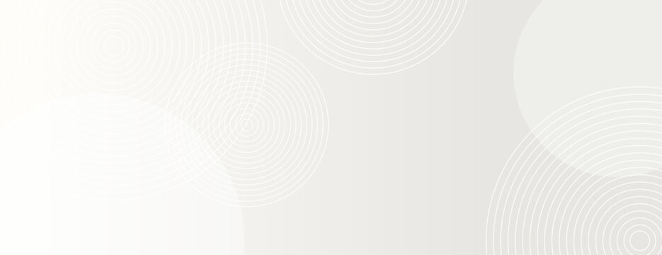 A light gray background with a subtle gradient. The background features circular patterns, adding texture to the gray color scheme. Circle pattern background vector. White background.