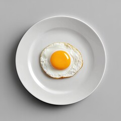 Fried egg on white plate