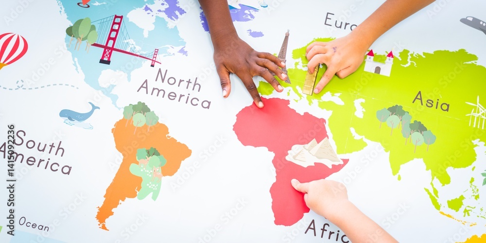 Poster children's hands on a colorful world map. diverse hands on map. exploring continents. learning geogr
