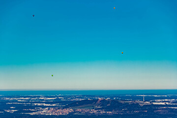 Alpine winter view with many hot air balloons at Bad Kohlgrub, Garmisch-Partenkirchen, Bavaria, Germany