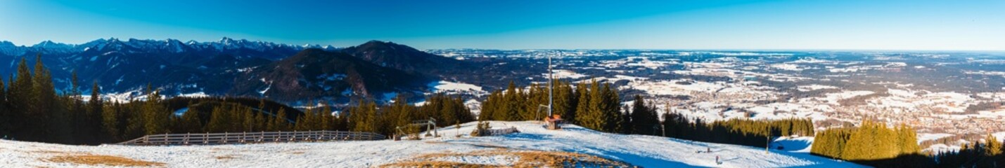 High resolution stitched alpine winter panorama with many hot air balloons at Bad Kohlgrub,...