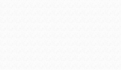 Professional female executive sitting at minimalist desk in bright modern office setting, focused on laptop while working on business tasks
