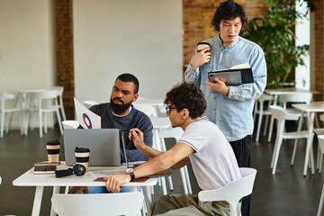 Team members actively collaborate around a table in a sleek office, exchanging ideas and insights