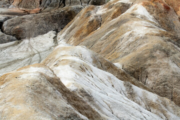 Ural Mars. An extraordinarily beautiful summer landscape with red lakes, colorful slopes and forest. A picturesque mountain range. Natural landscape, impressive sky. Nature of the Urals.