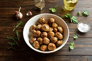 Oven baked baby potatoes with olive oil, garlic and herbs