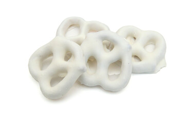 White chocolate covered pretzels on white background