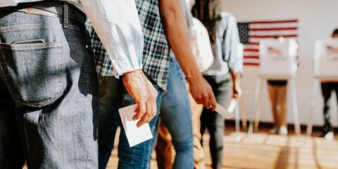 Diverse people in line voting in election, holding ballots. Voting in election, diverse group of...