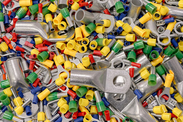 A lot of electrical terminals, connectors and tips of various shapes, sizes and colors