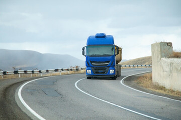 Truck driving at the highways. Transportation. Delivery