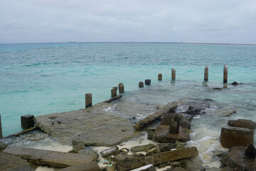 rotten jetty on gulhi island on the maledives