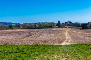 St Giles' church and footpath in Shipbourne near Tonbridge, Kent, England in Spring
