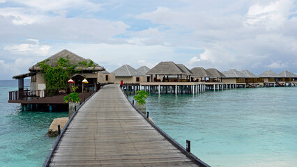 Fototapeta premium water villas on a exotic maldives island