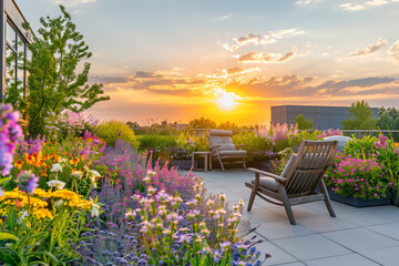 A garden with flowers on top of rooftop of the modern building.  The sunrise in a big city with tall buildings