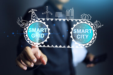 Smart grid and smart city concept with engineer pointing to smart grid icon to deliver electricity to smart city in belt driven to support electric energy supply and urban expansion.