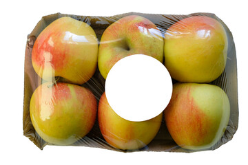 Plastic-wrapped tray of six apples in a cardboard container. Isolated. Circle used for placeholder...