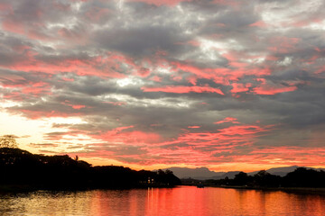 Scenic View of Lake During Sunset with Vibrant Sky Reflection