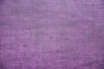 Purple linen fabric texture closeup as textile background