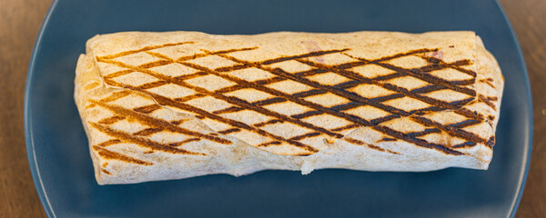 Grilled beef chicken shawarma wrap ready to eat