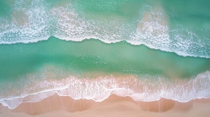 Obraz premium Aerial View Turquoise Water Meets Sandy Beach