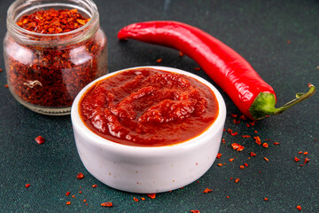 Traditional Korean fermented red chili pepper paste, Gochujang, spicy, sweet-salty, deep umami flavor, food ingredient for preparing asian dishes
