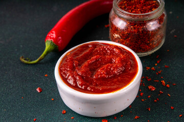 Traditional Korean fermented red chili pepper paste, Gochujang, spicy, sweet-salty, deep umami flavor, food ingredient for preparing asian dishes