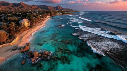 Naklejka premium Vibrant Sunset Over Serene Beach with Rocky Shoreline and Waves