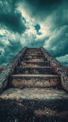 Ancient stone steps leading upward to a stormy sky