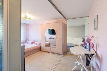 interior room apartment bedroom with bed, cozy place to sleep and relax