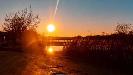 Winter sunset or sundowner view with reflections near Niederpoering, Isar, Oberpoering, Deggendorf,...