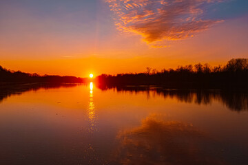 Winter sunset or sundowner view with reflections near Niederpoering, Isar, Oberpoering, Deggendorf, Bavaria, Germany