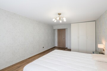 interior room apartment bedroom with bed, cozy place to sleep and relax