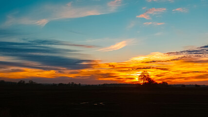 Sunset with dramatic clouds near Wallersdorf, Dingolfing-Landau, Bavaria, Germany