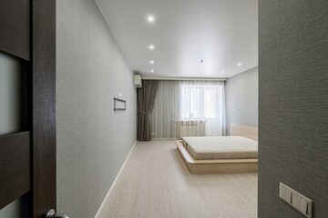 interior room apartment bedroom with bed, cozy place to sleep and relax