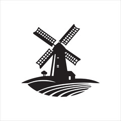 Fototapeta premium Silhouette of a Windmill in the Countryside