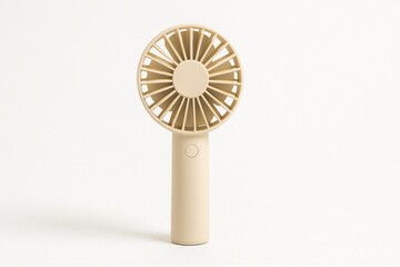  a compact, portable handheld mini fan in a light beige color, centered upright against a clean white background