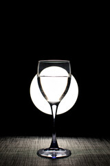 Composition with a glass with a water	